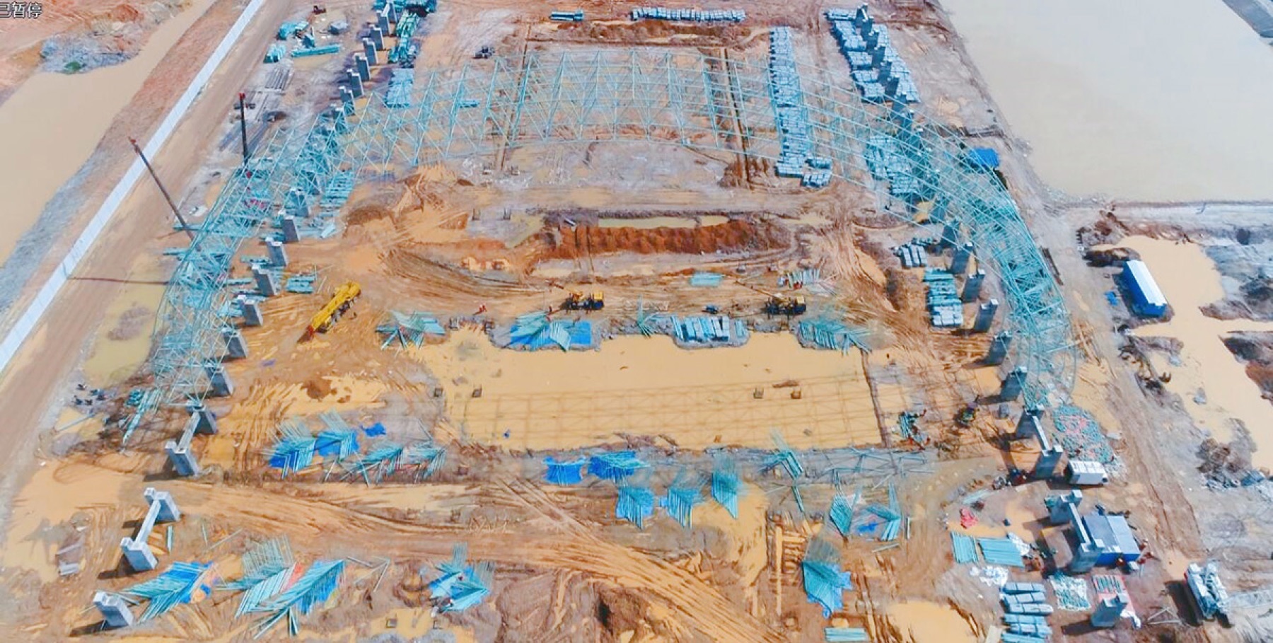 BAFANG steel space frame under erection at dusk