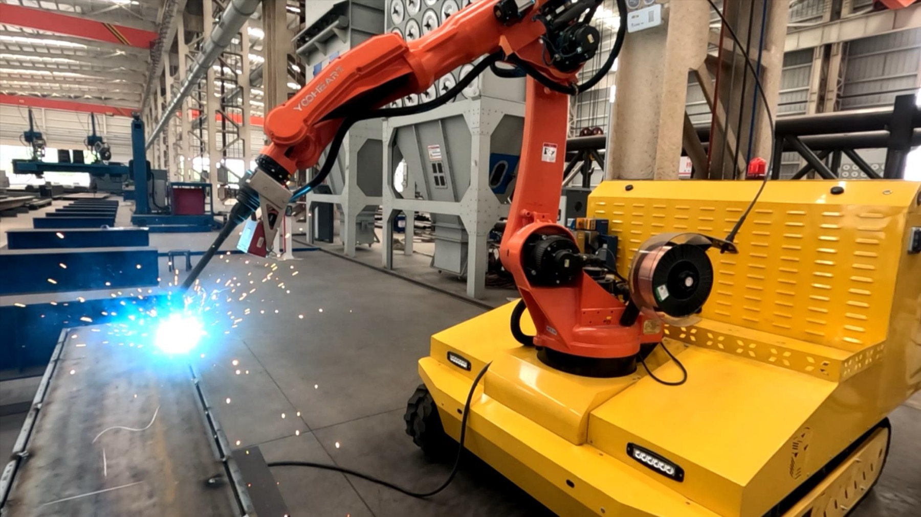 Robotic welding arm on heavy plate girders