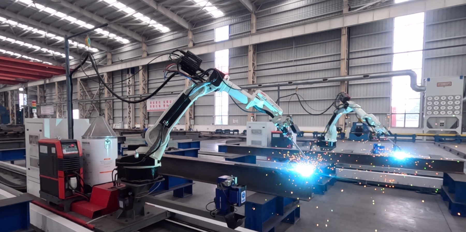 Twin robotic welders running in parallel